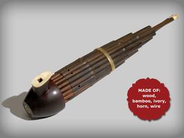 Wind instrument called sheng that is made out of wood, bamboo, ivory, horn, and wire