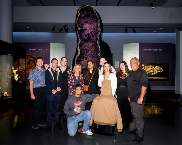 Museum staff and members of the Hawaiian delegation take one last photo in the Mignone Hall of Gems and Minerals before saying goodbye.