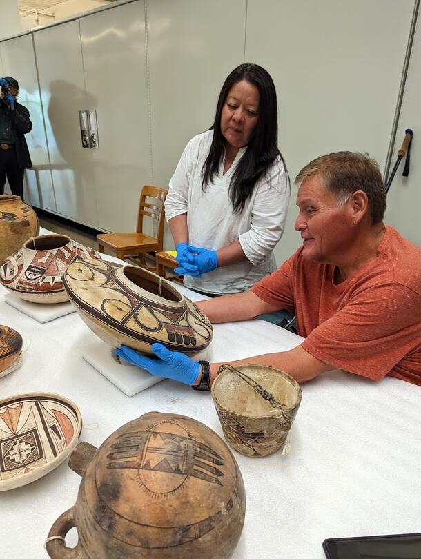 Potters, project consultants, and AMNH staff examining Southwestern pottery